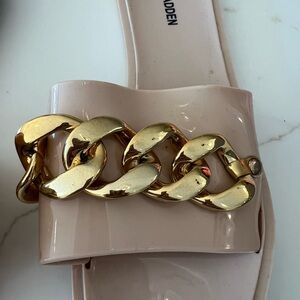 Tan slides with gold detail